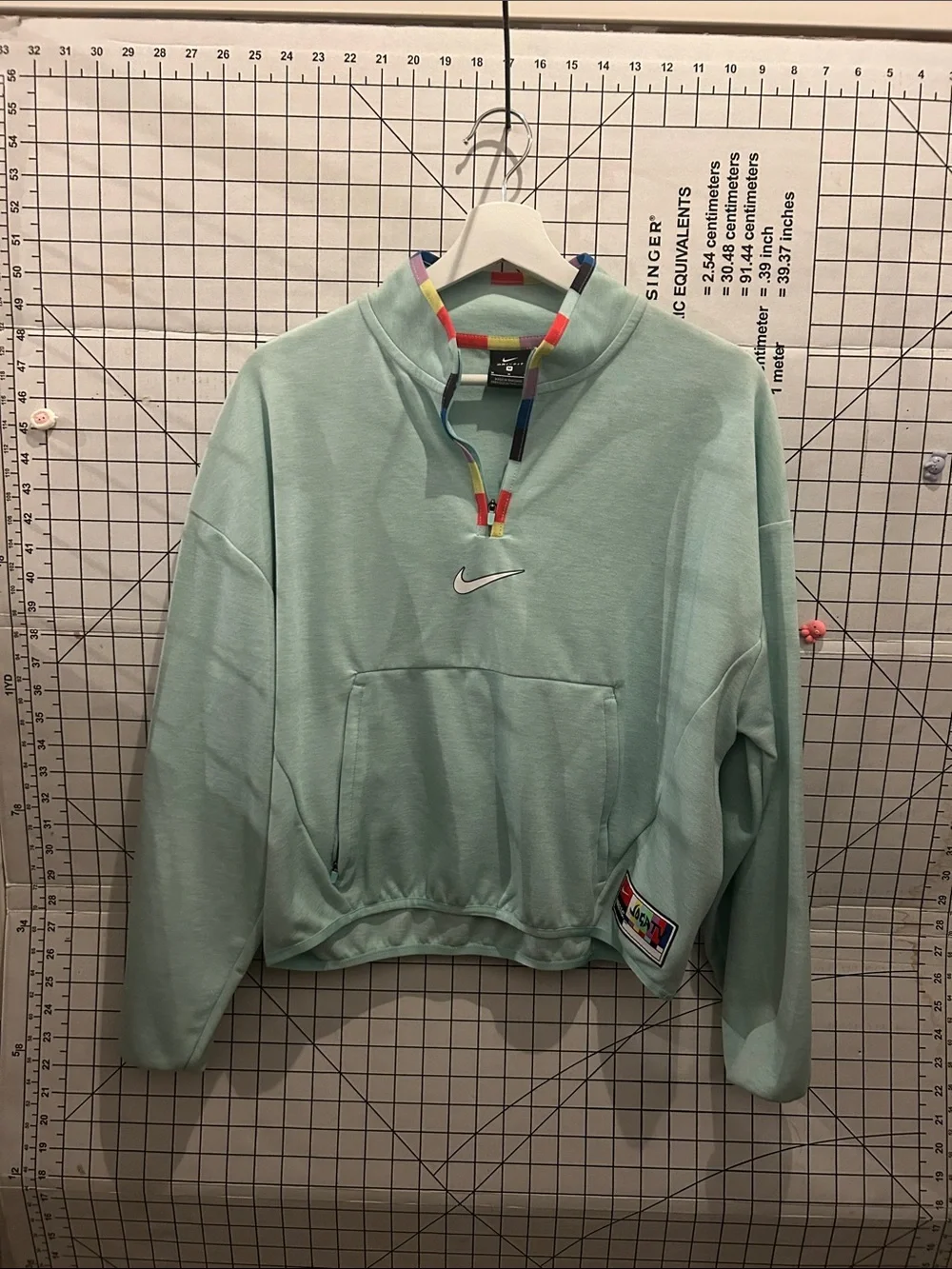 Nike Jogatv Mint Green Quarter-Zip Pullover with Rainbow-Trim Collar